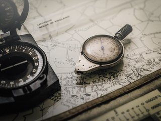 shallow-focus-photography-of-black-and-silver-compasses-on-1203808.jpg